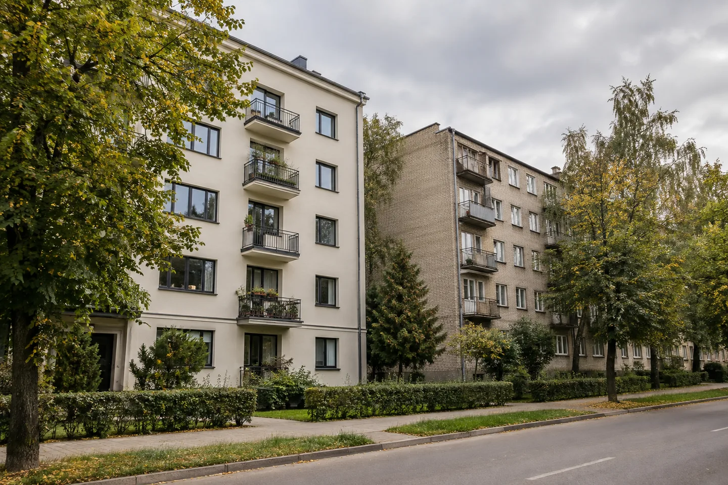 Apartment blocks with different facade conditions, illustrating comparable-property selection for pricing.